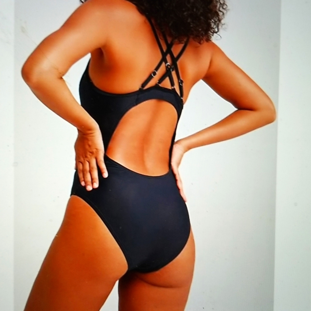 NWT LEOTARD BATHING SUIT SPORTS COSTUME FOR TEENS. SIZED FOR TEENS